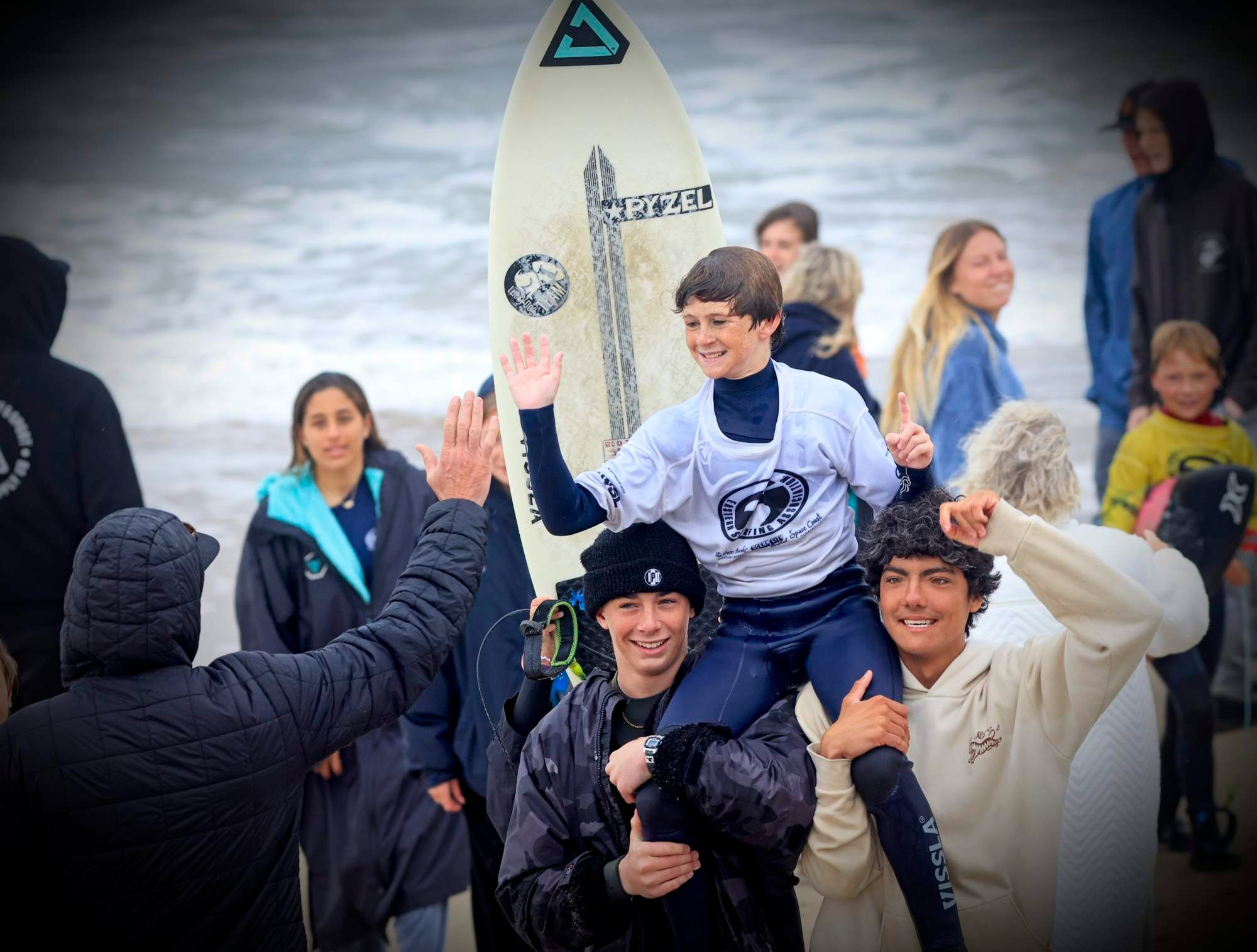 ESA Surfers Walking on the beach
