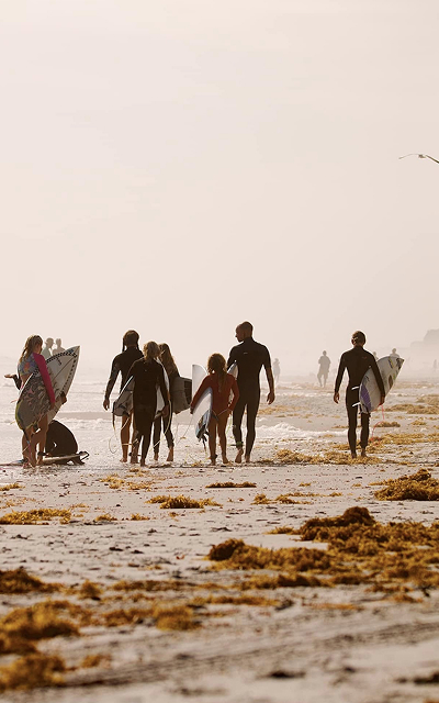 ESA Surfers Walking on the beach